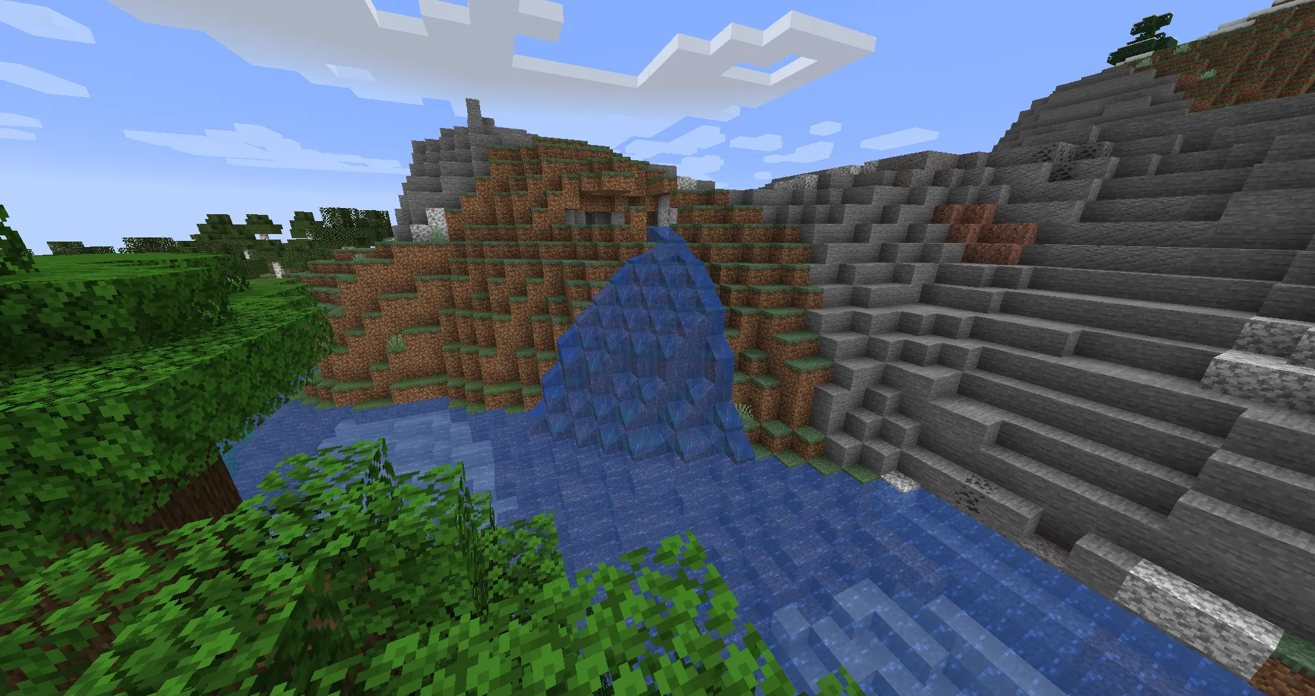 Minecraft waterfall flowing down a mountain — the foam effect would have added white particles at the base